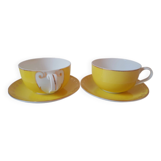 Duo of vintage yellow and gold breakfast cups. Semi porcelain, light. Nice capacity.