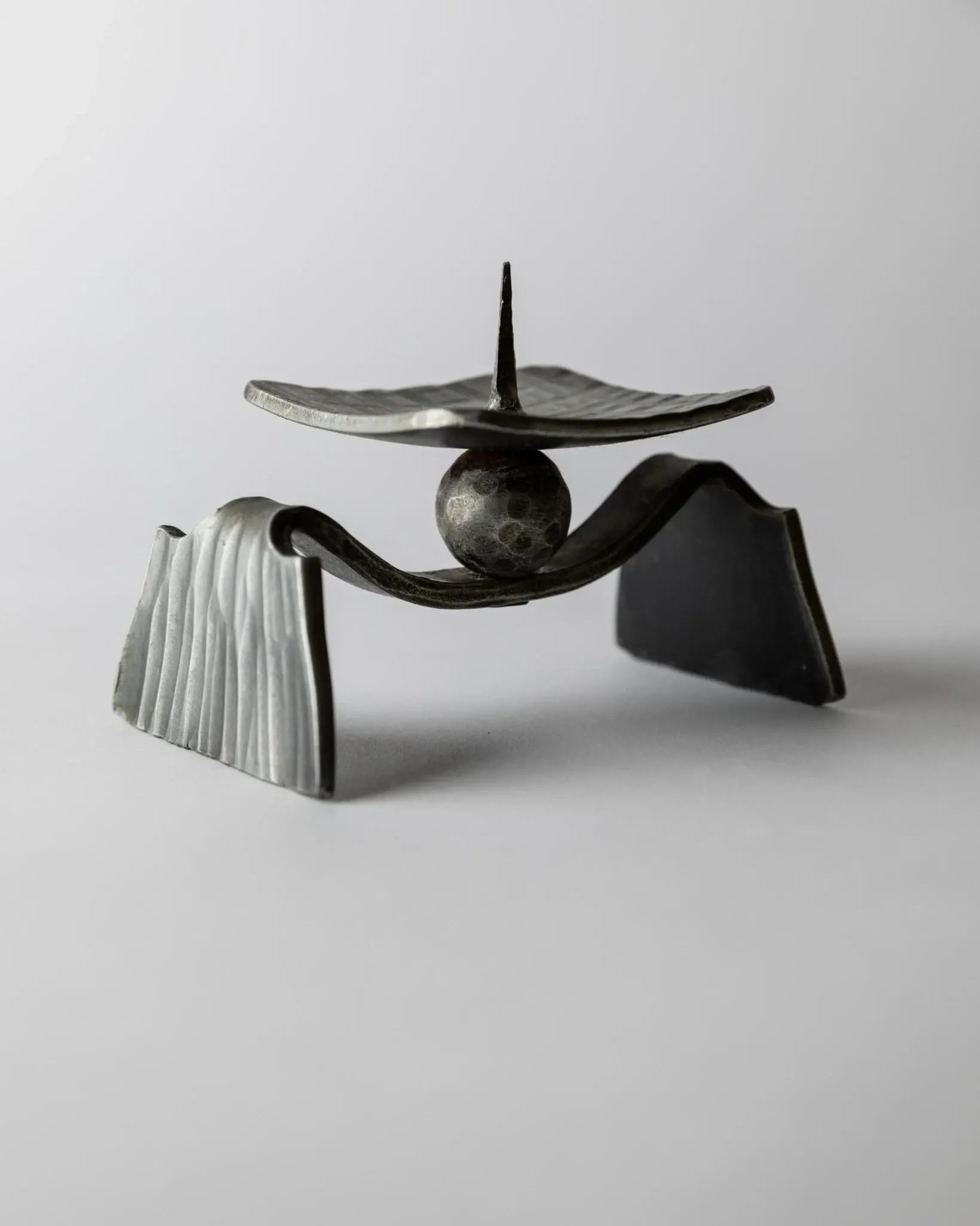 Vintage brutalist iron candlestick from the 1970s.