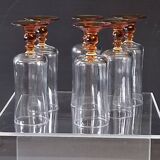 6 amber-footed champagne flutes in very good condition.