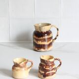 3 old bicoloured enamelled stoneware jugs