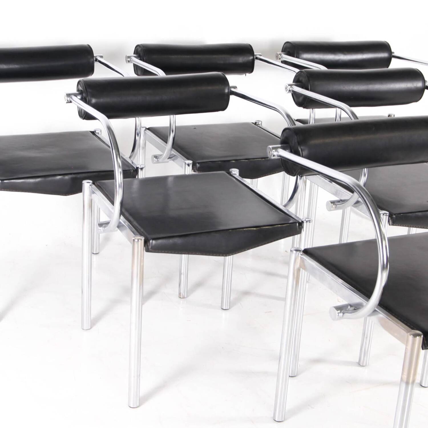 Set of 6 chrome and leather chairs