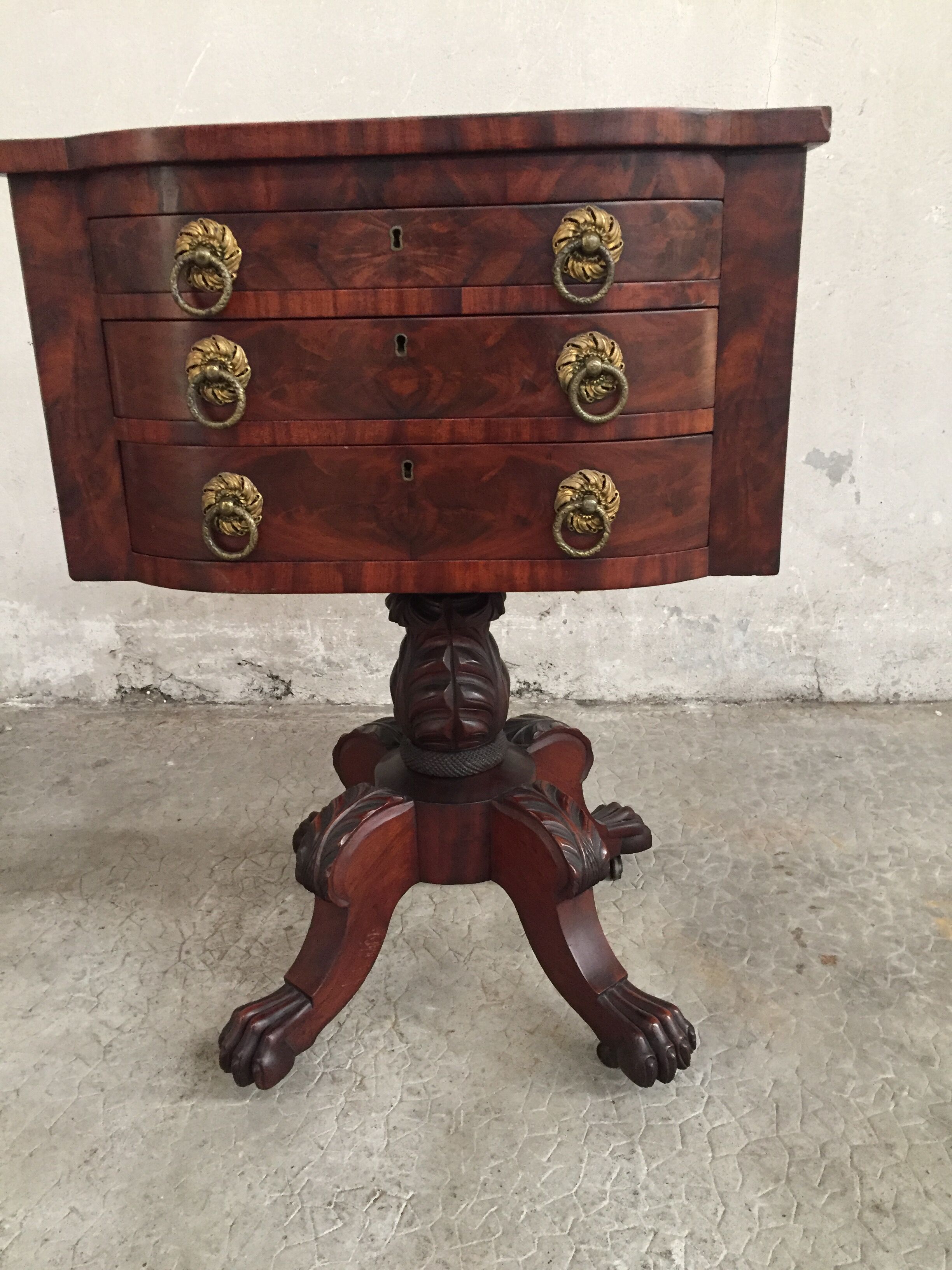Small piece of english furniture has 3 drawers in mahogany for silverware