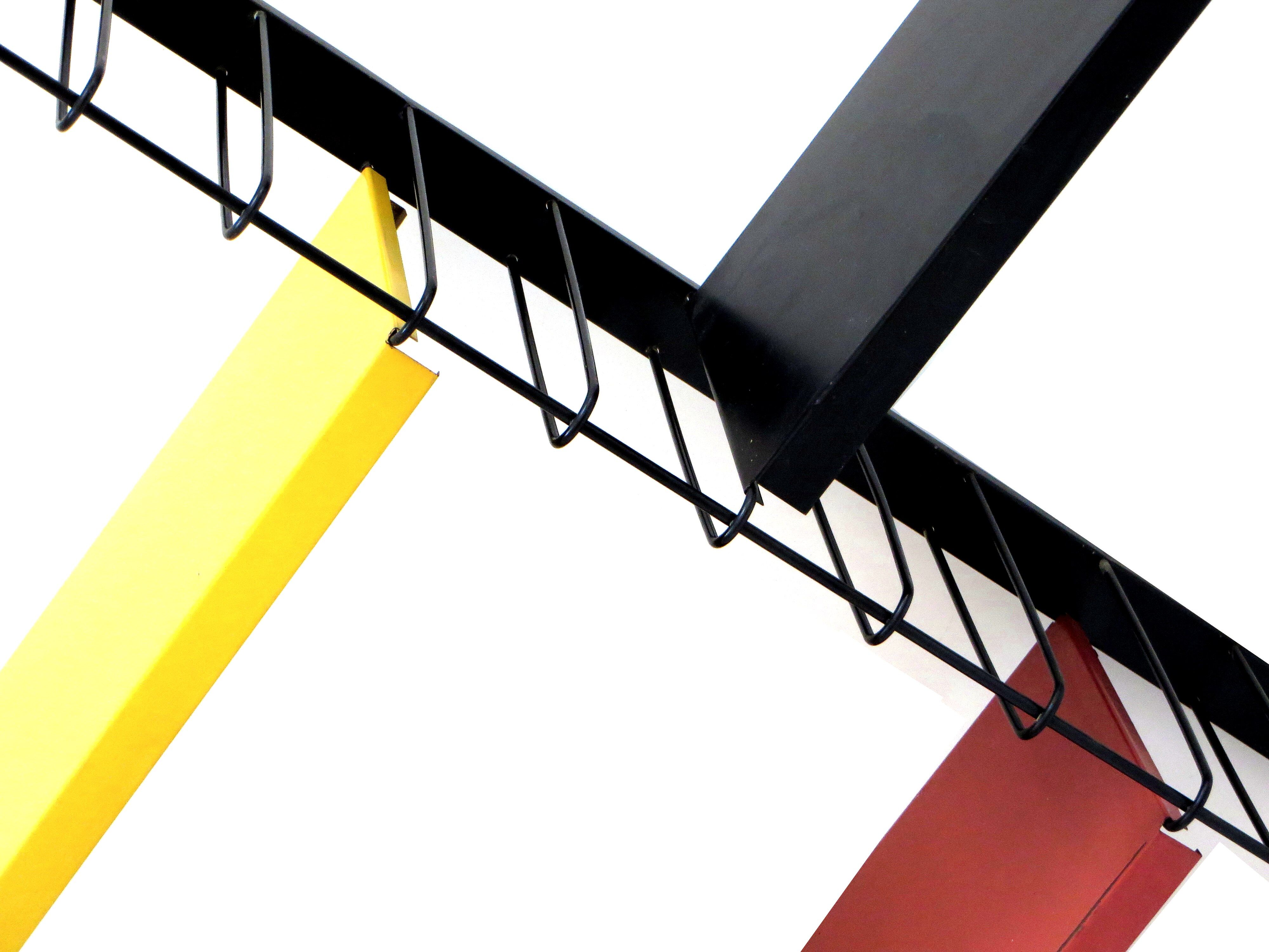 Vintage bookshelf / wall system from Tomado in metal with black frame with 5 shelves