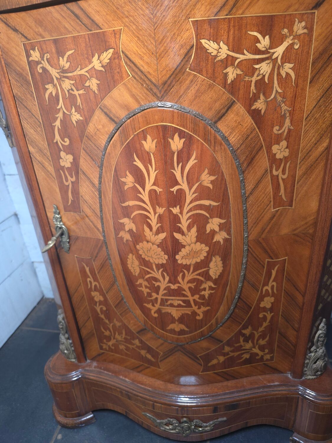 Small support table in Louis XV style with marquetry and bronze.