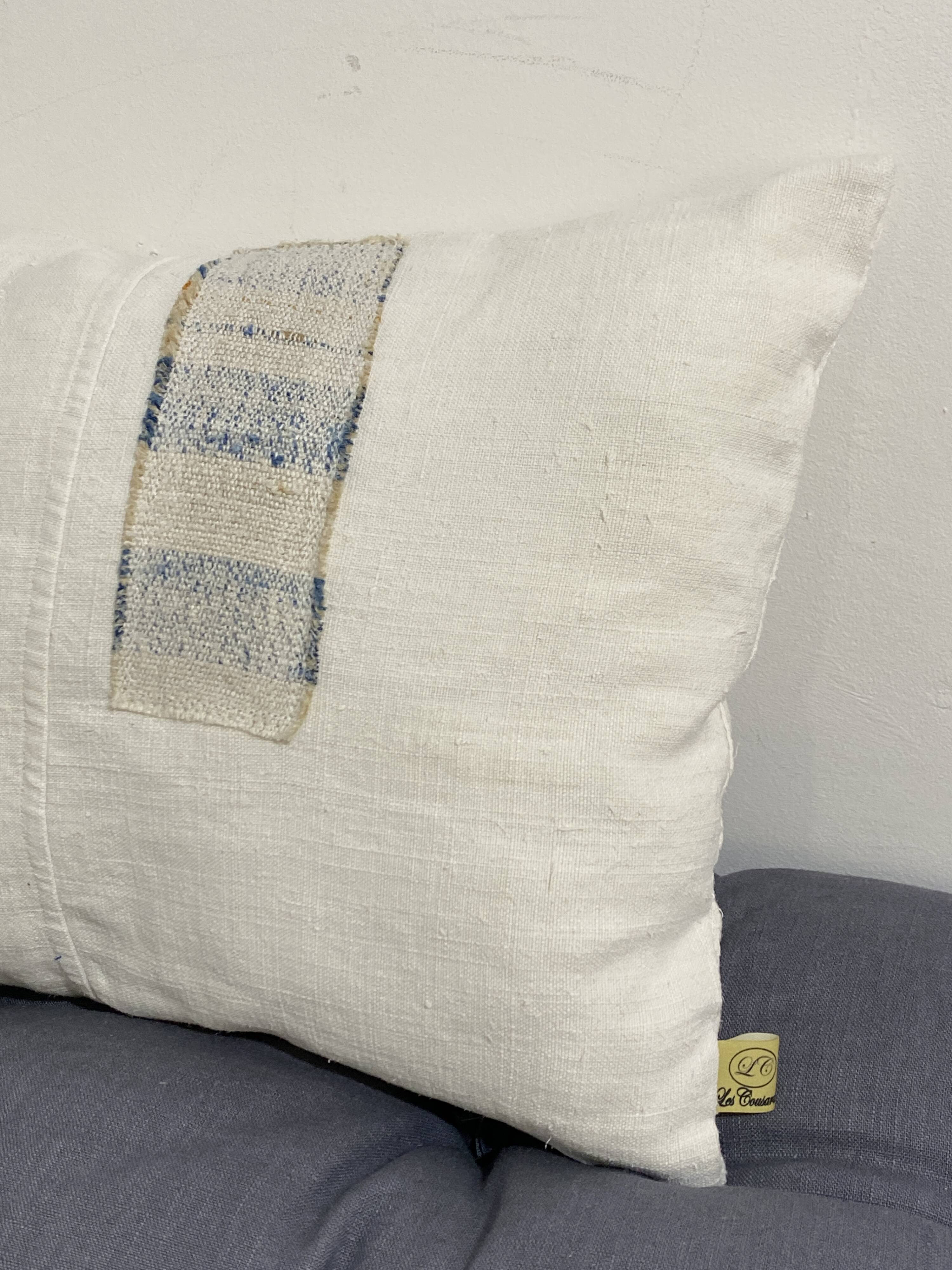 Coussin artisanal en toile ancienne style Kilim