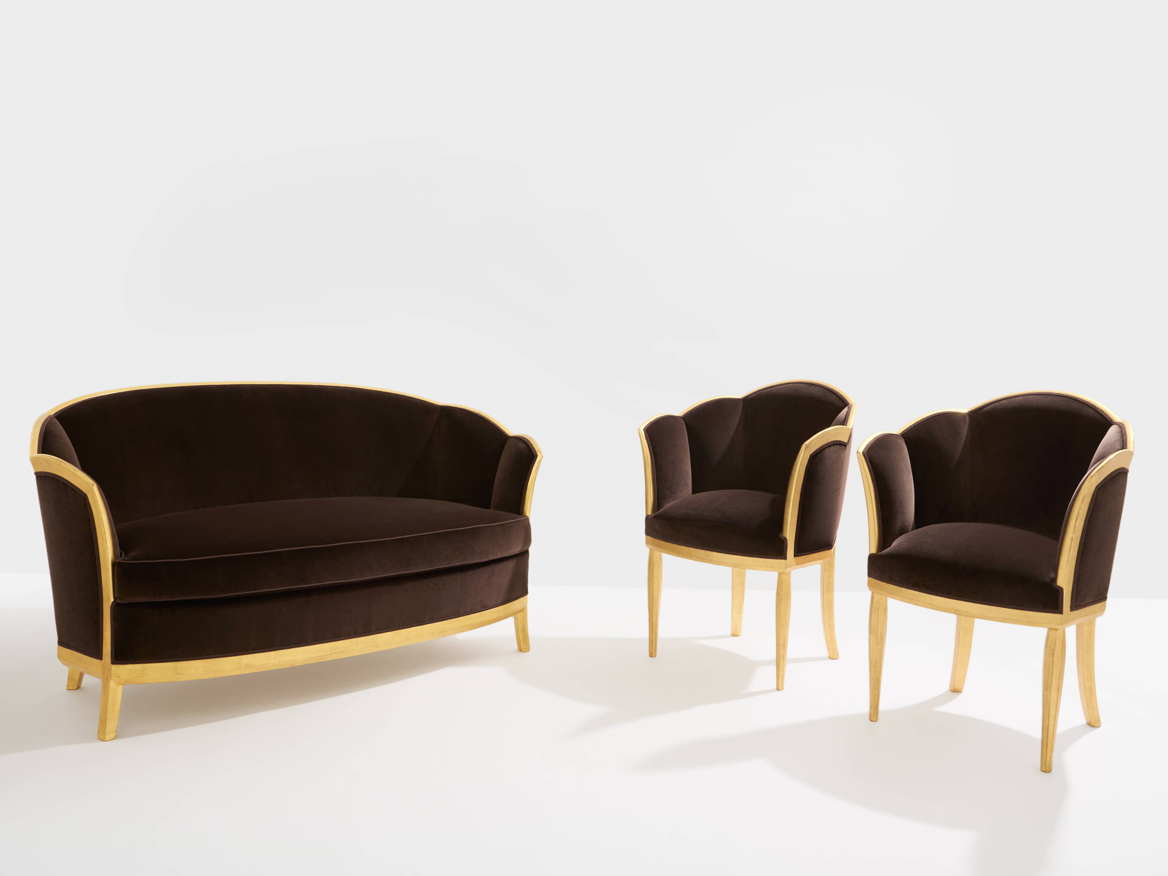 Maurice Dufrène pair of armchairs, gilded wood, brown velvet, 1925.