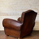 French leather club chair, chapeau de gendarme model, circa 1940