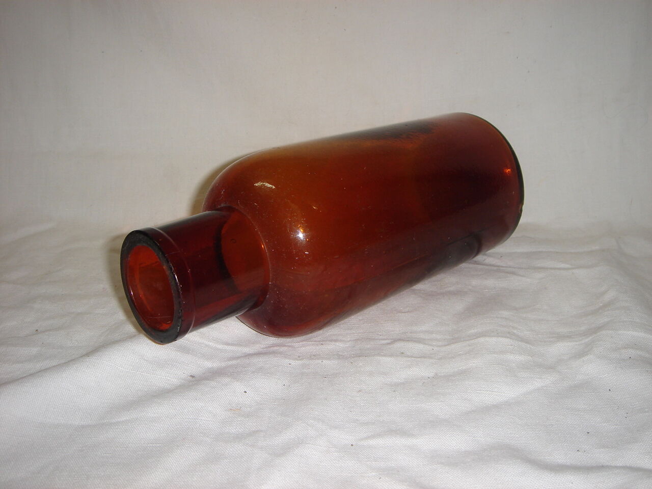 Former pharmacy early 20th amber glass bottle