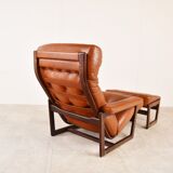 Vintage leather armchair with hocker, 1970s