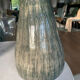 New green ceramic artisanal vase.