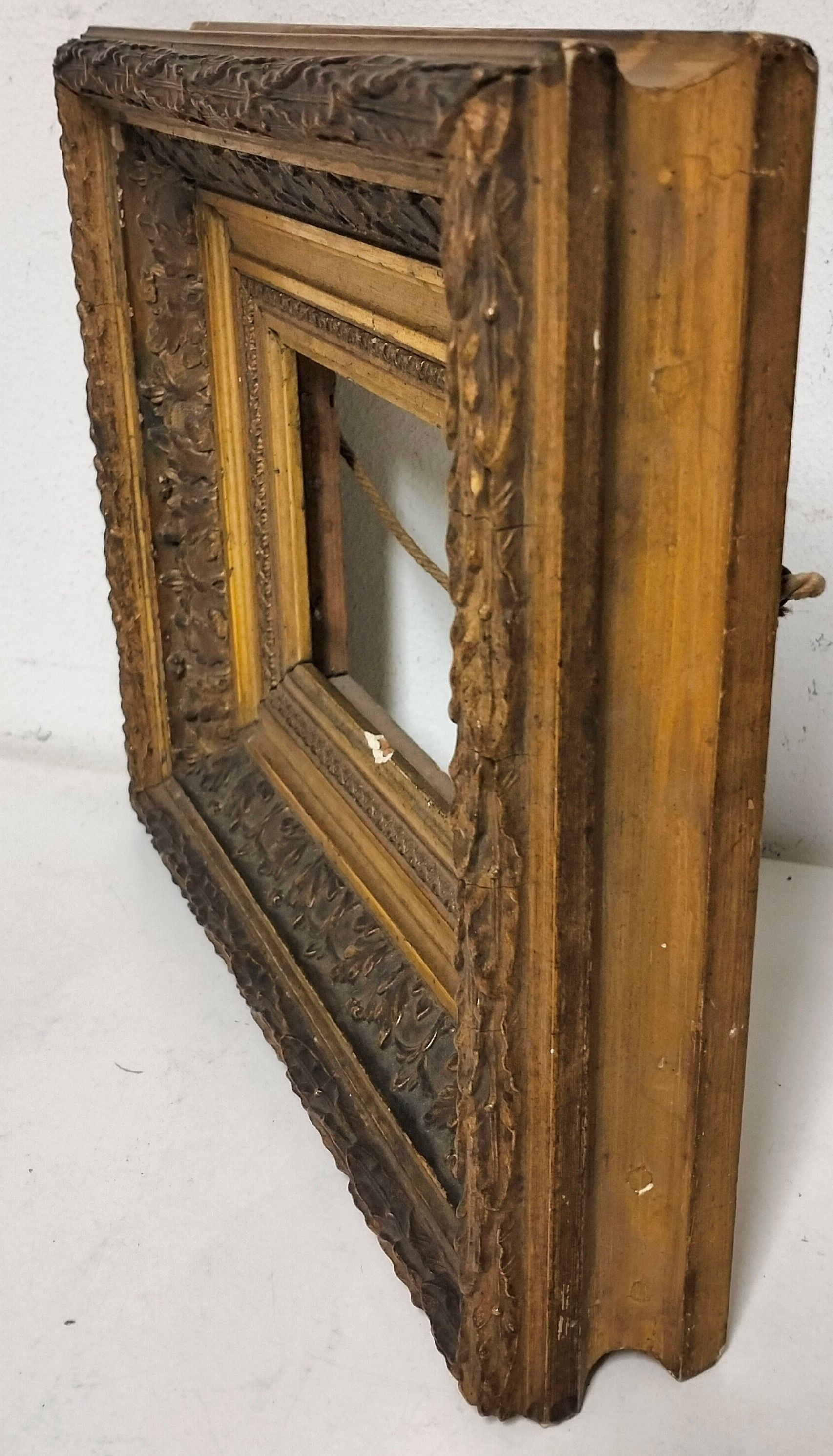 Frame wood and gilded stucco