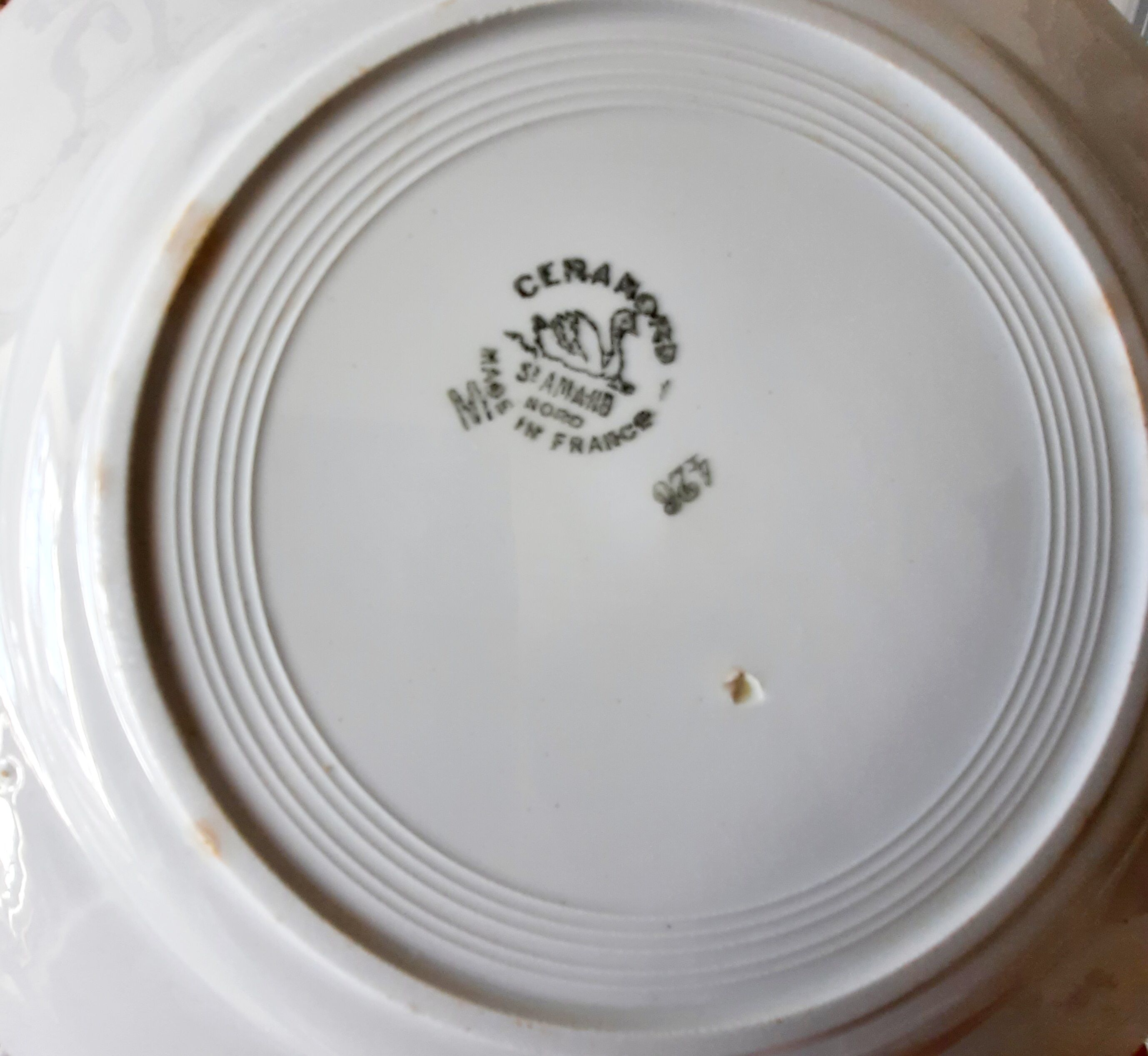 Old flat plates mismatched in earthenware