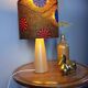 Table lamp in blond wood with handmade wax shade
