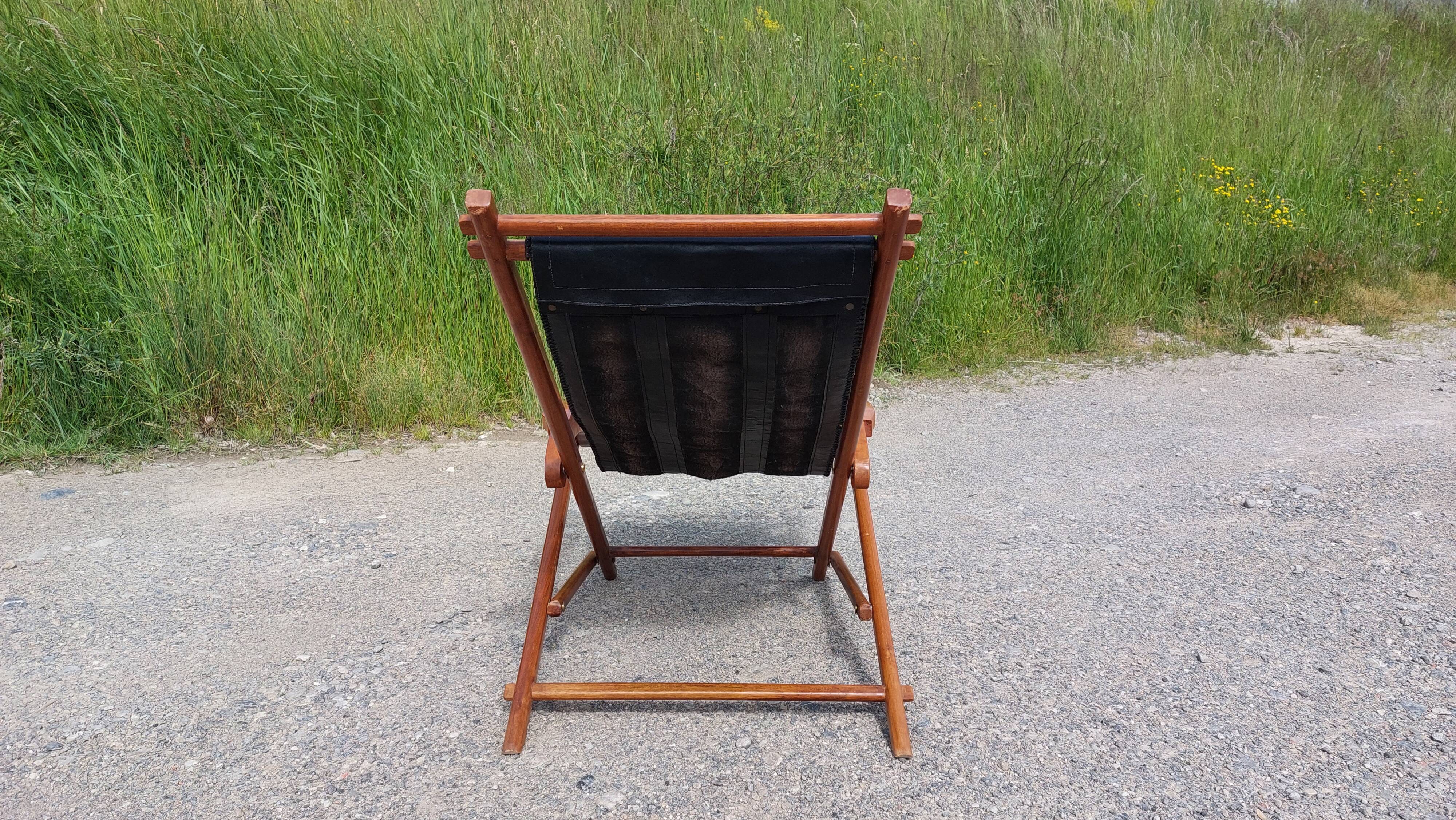Old deckchair deck chair in wood and black leather - 40s