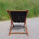 Old deckchair deck chair in wood and black leather - 40s