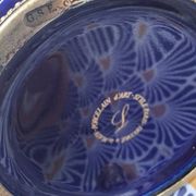 Cobalt blue porcelain bonbonnière with gold decoration on feet.