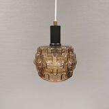 Older hanging lamp with champagne colored outer glass with inner shade of crystal glass.