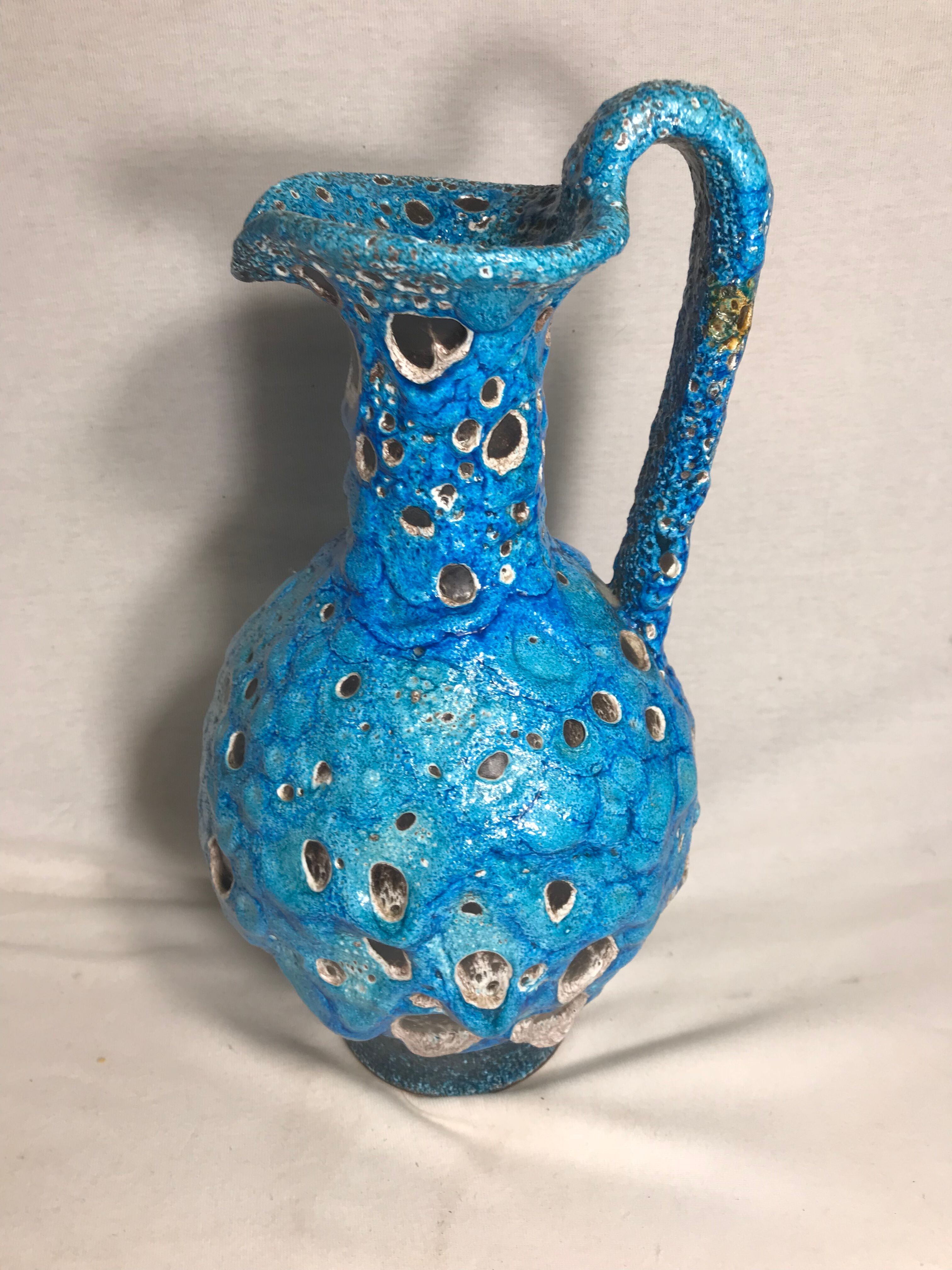 Former pitcher in blue ceramic