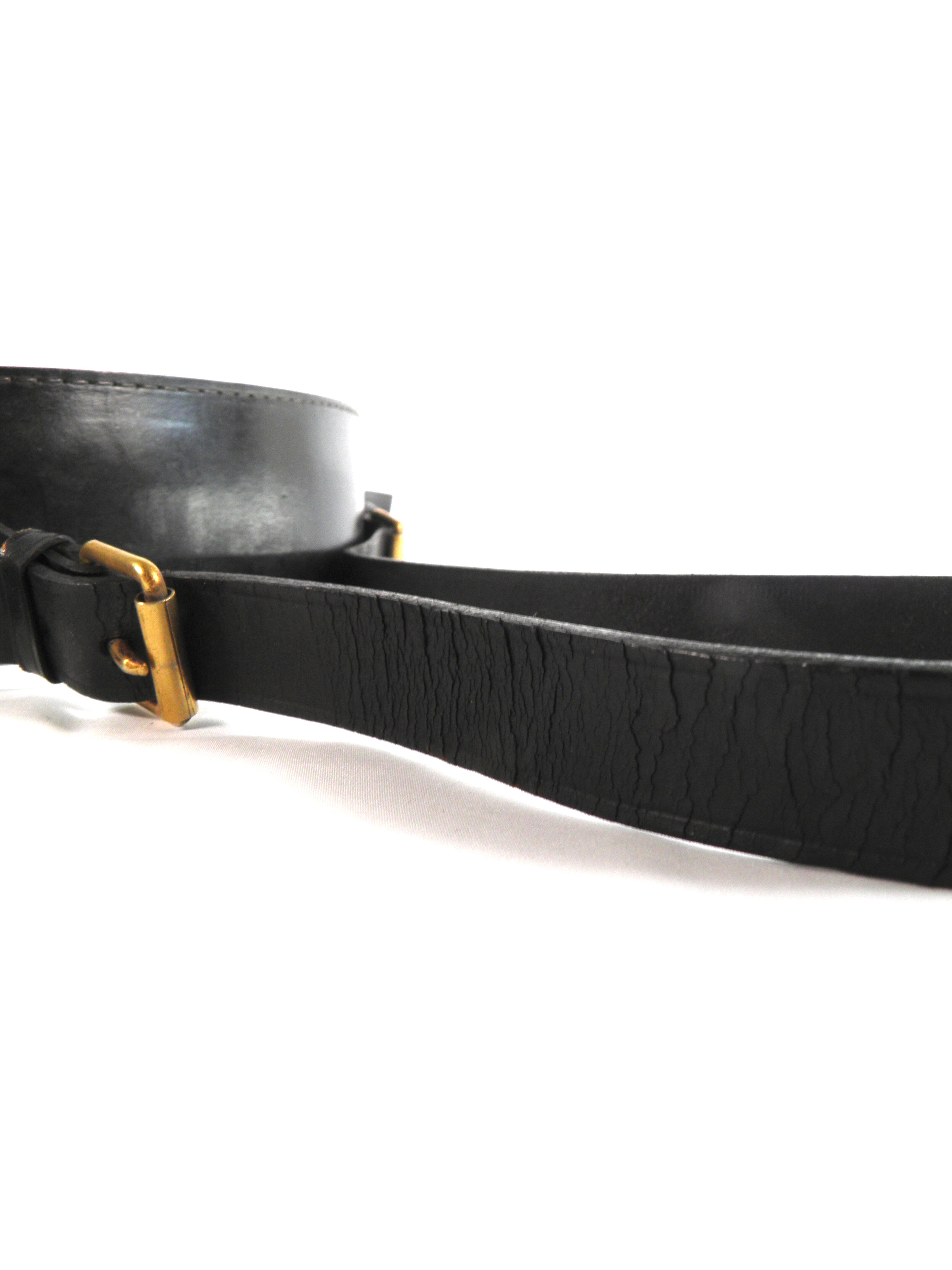 Circular mirror in black leather Jacques ADNET 1950