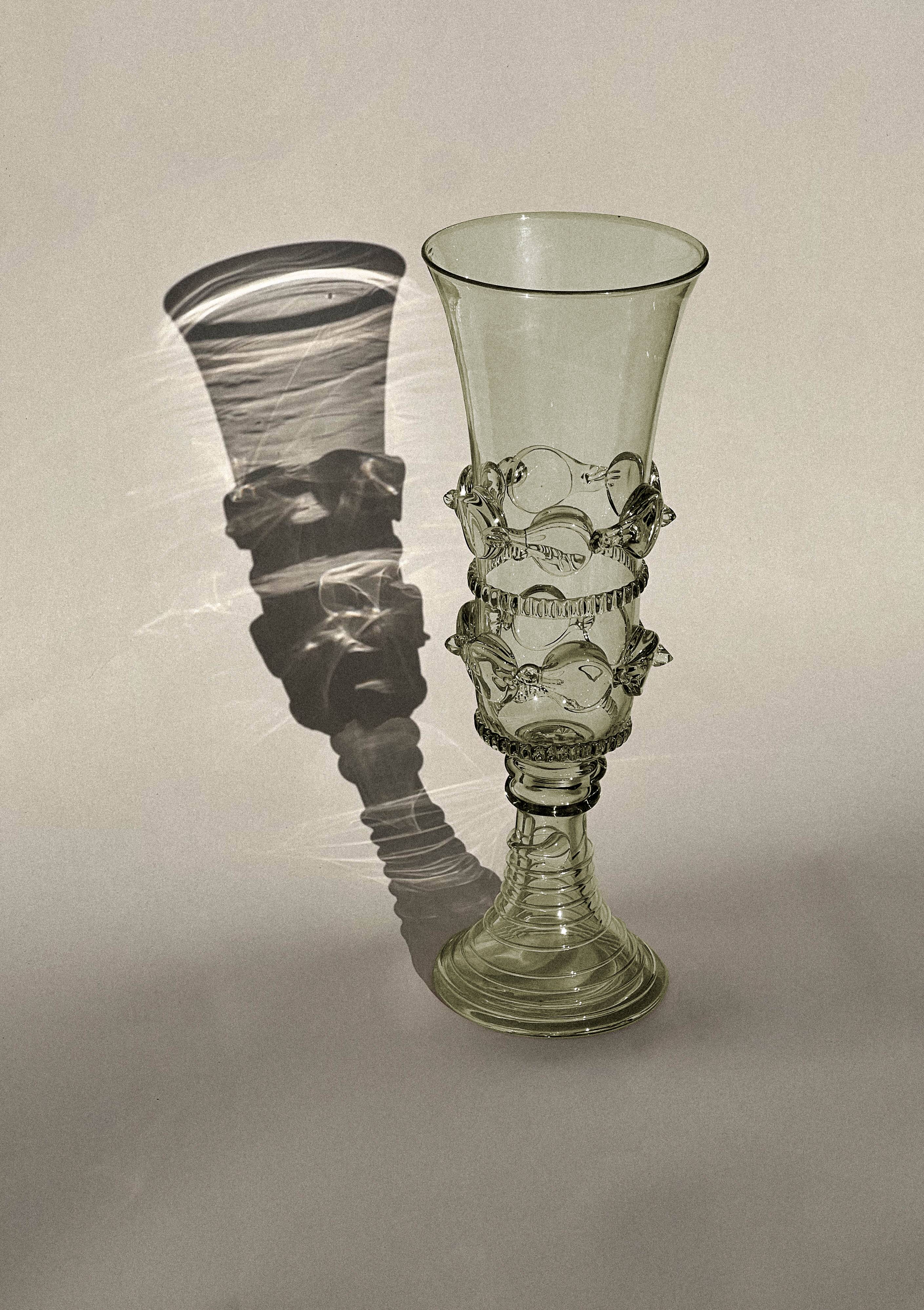 pair of green glass champagne flutes - points