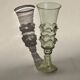 pair of green glass champagne flutes - points