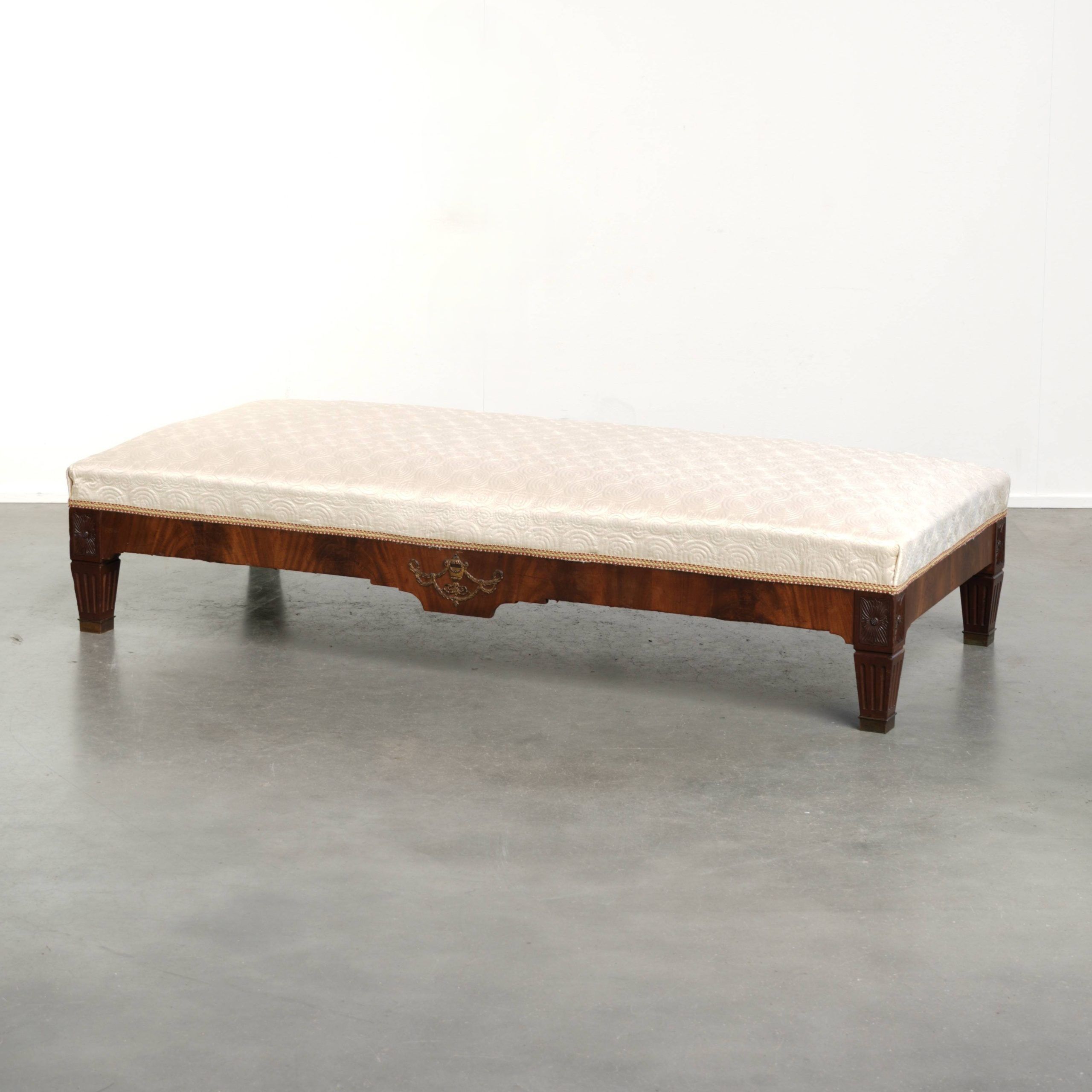 Antique French sofa from the 19th century in Empire style with a silk seat