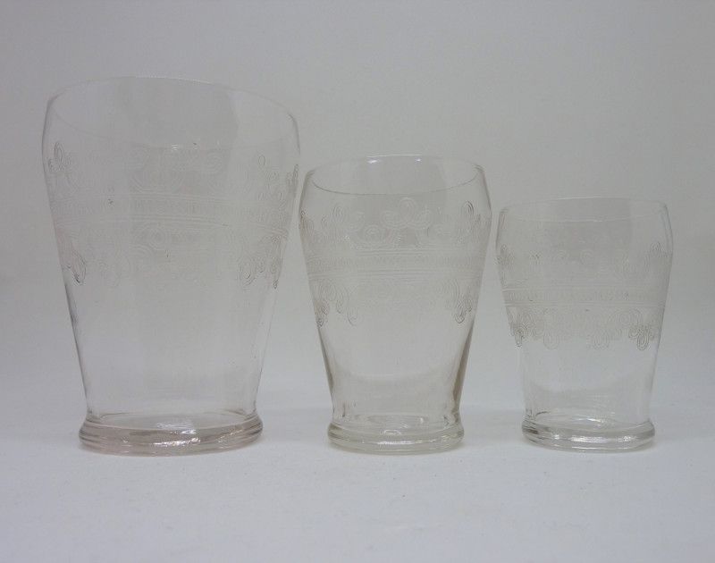 32 antique glasses engraved with Friezes of Arabic and spirals