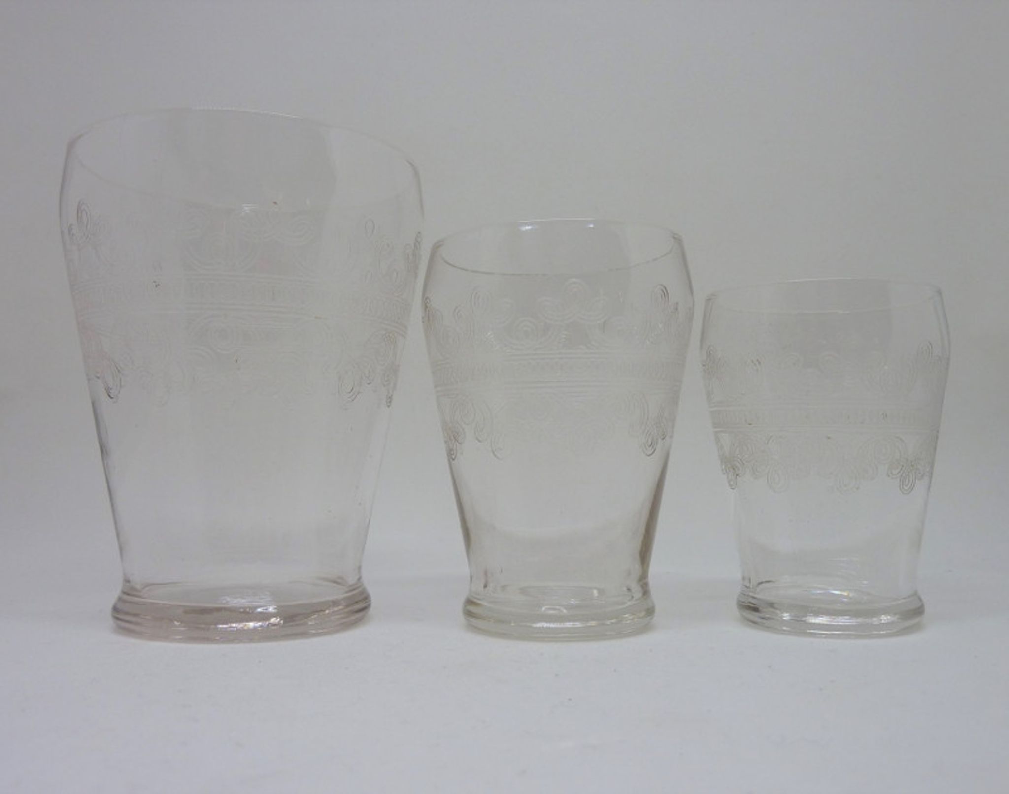32 antique glasses engraved with Friezes of Arabic and spirals