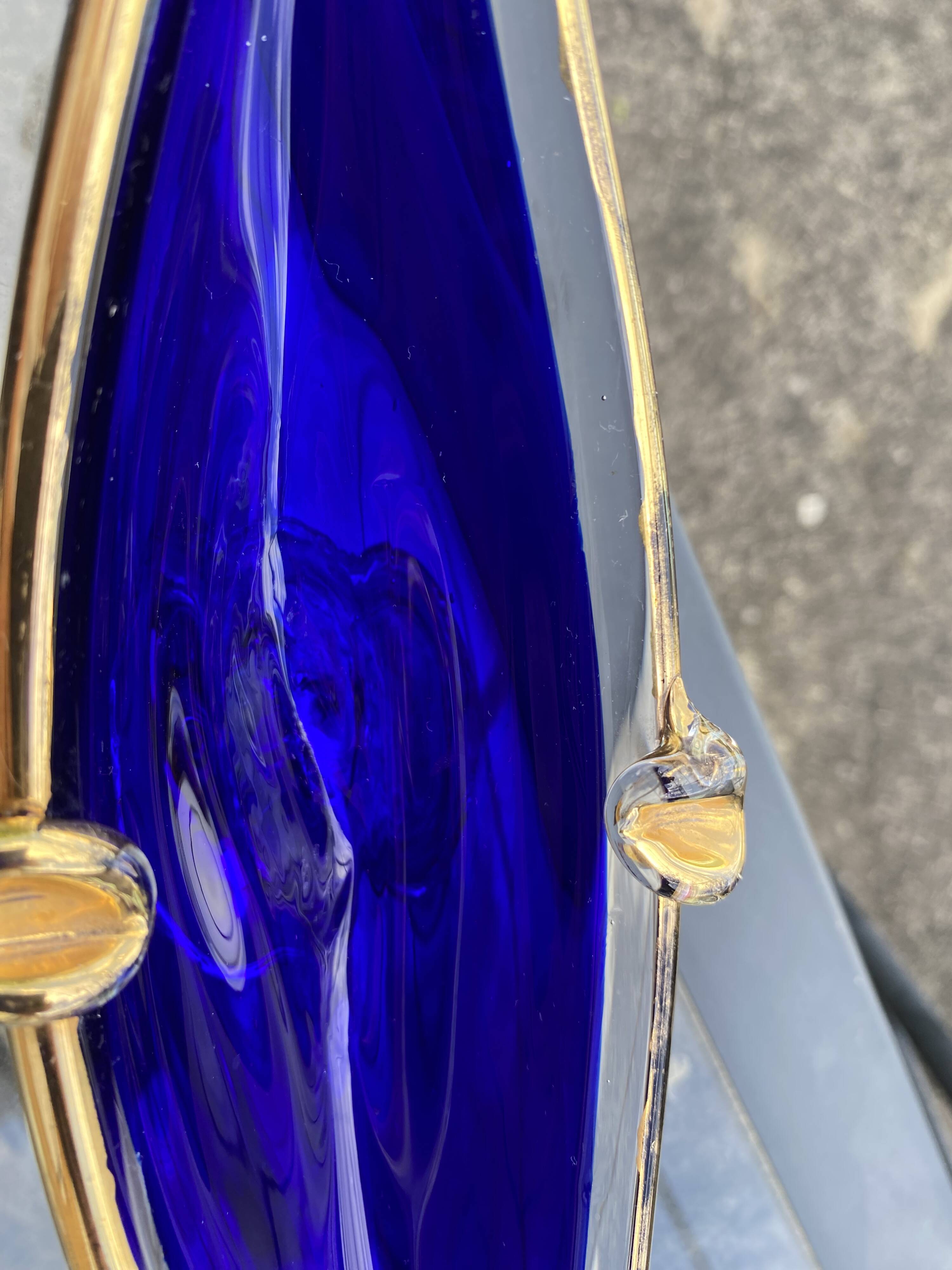 Vintage cobalt blue Murano glass gondola bowl with gilding.