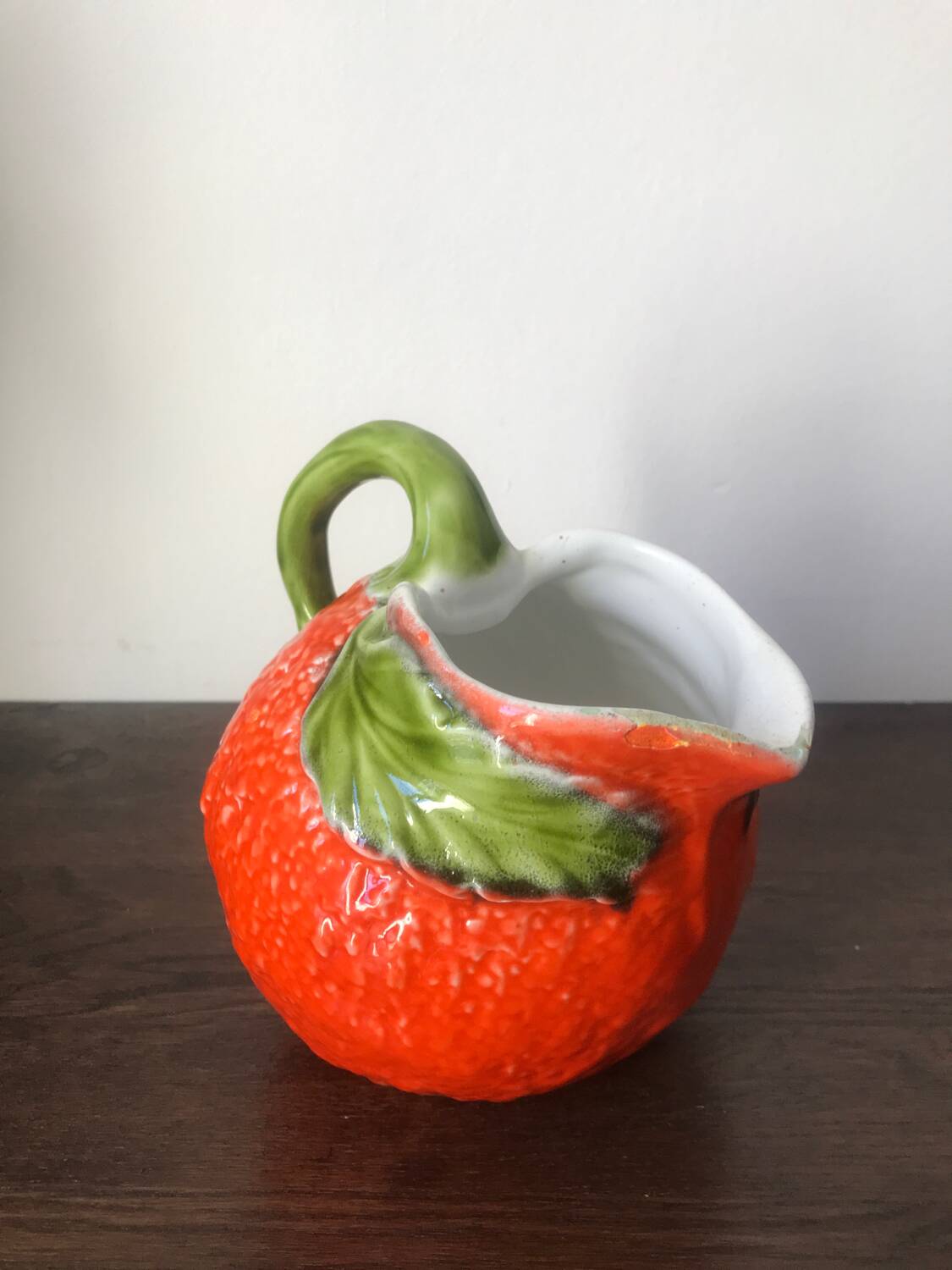 Orange slip pitcher