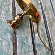 Brass hand candlestick