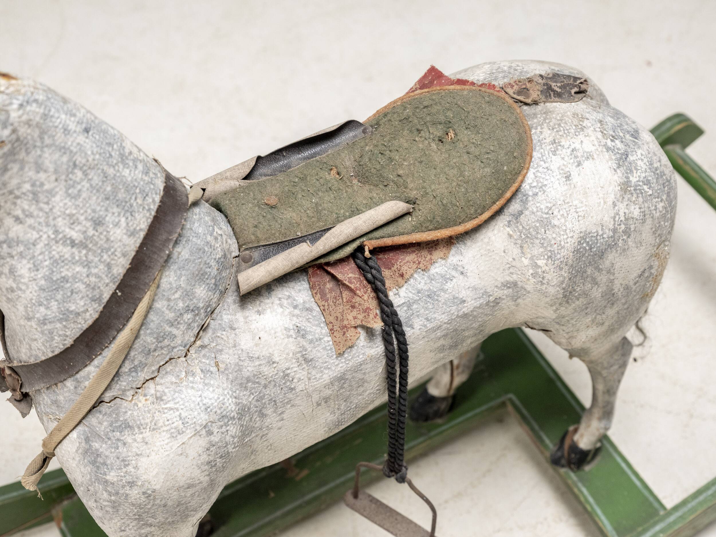 Antique wooden rocking horse, vintage toy with original patina.