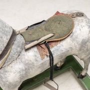 Antique wooden rocking horse, vintage toy with original patina.