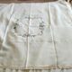 Antique linen tablecloth embroidered with flowers