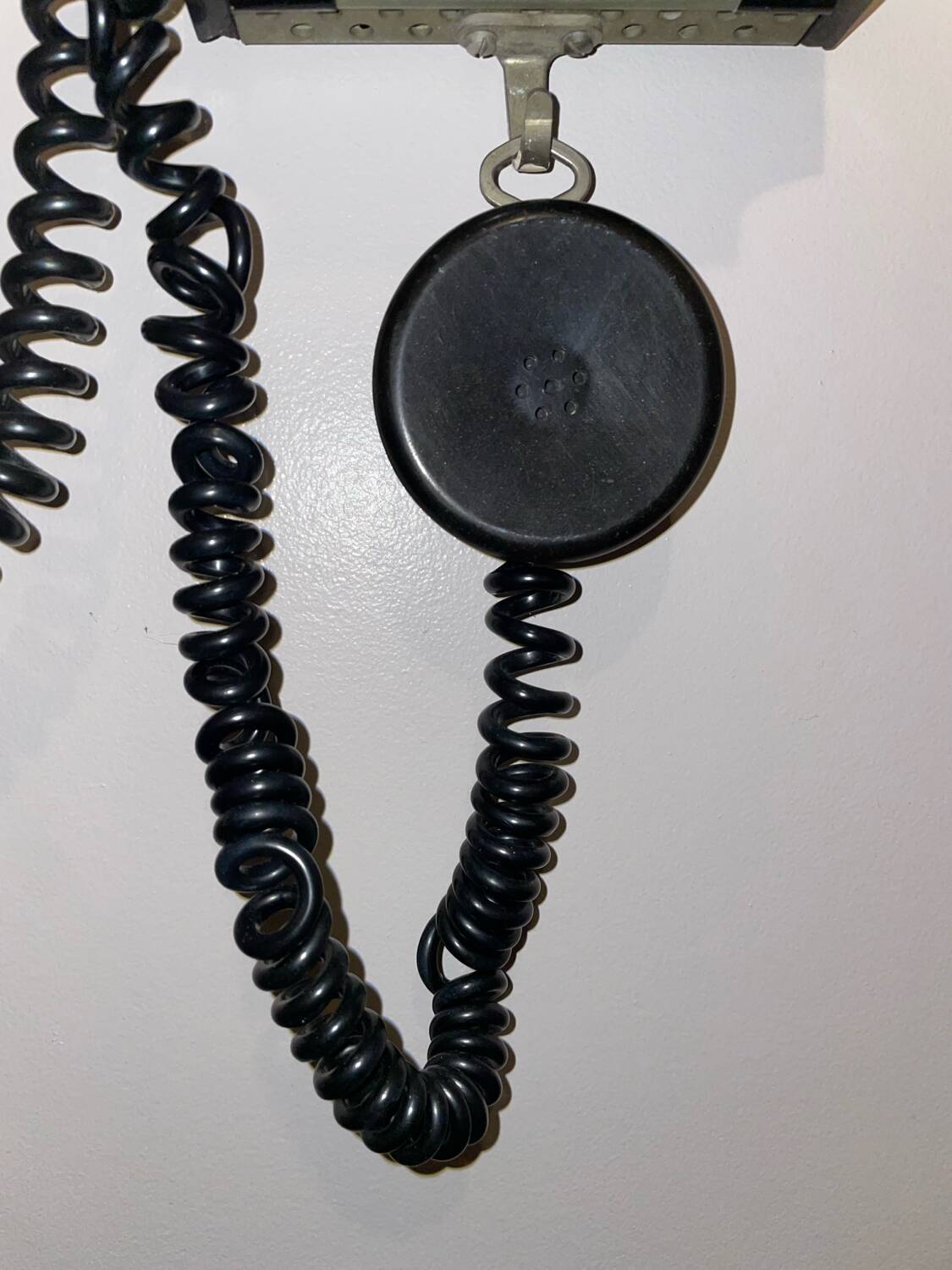 Old Ericsson wall telephone in black bakelite