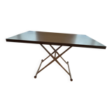 Table that can be transformed into a coffee table with 2 height settings