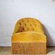 Fauteuil crapaud velours capitonné jaune