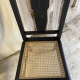 Black chairs and cannage