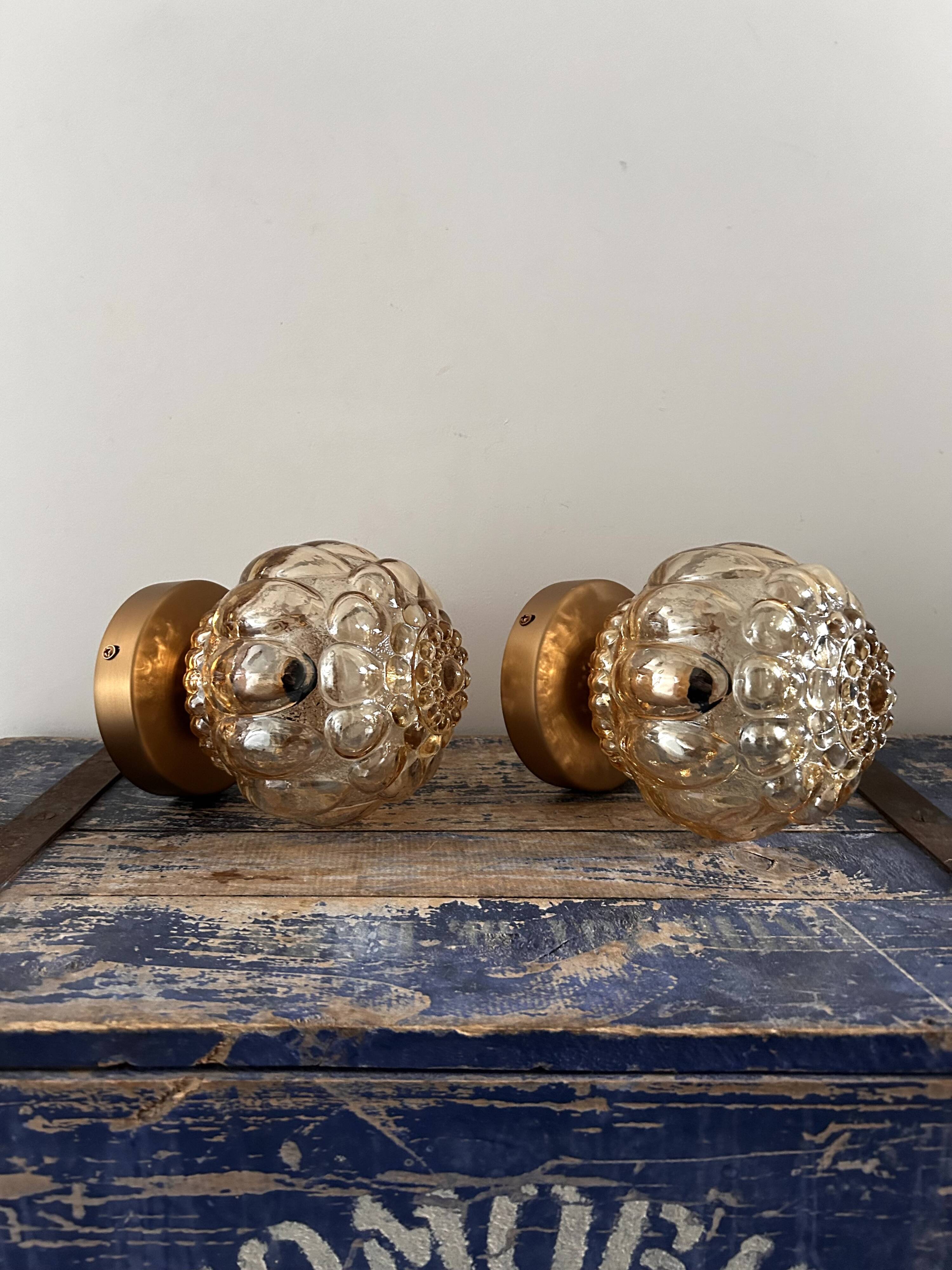 Pair of Scandinavian golden globe wall lights