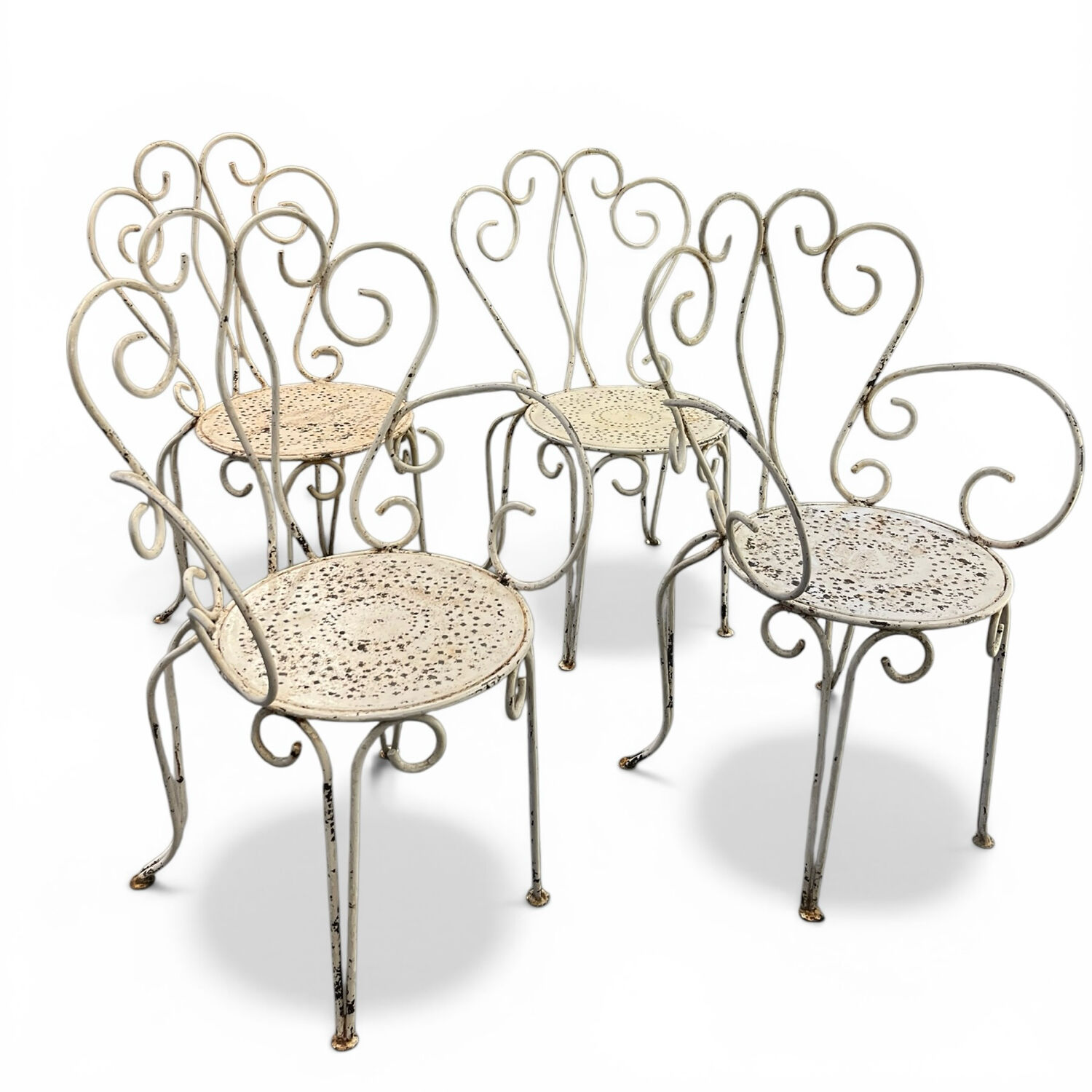 Set of 4 white wrought iron garden chairs, 1950s.