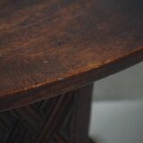 Sculptural African stool in hardwood, curved seat and architectural base, 1970s.