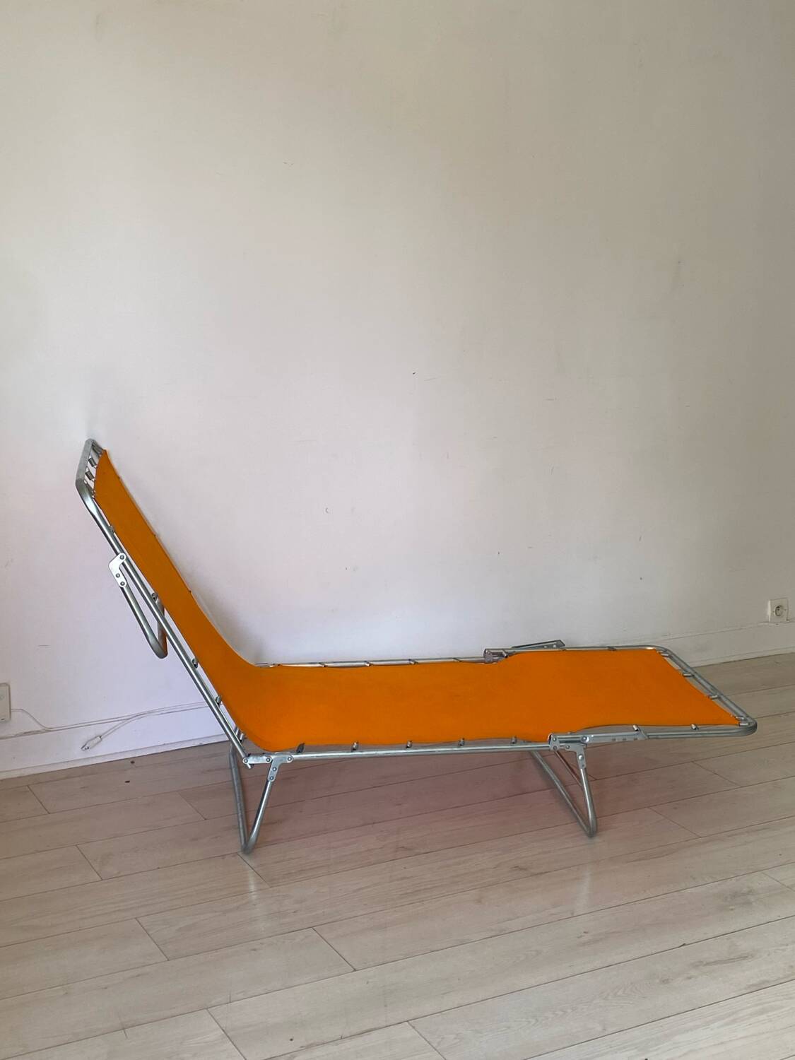 Orange and metal deckchair 1970