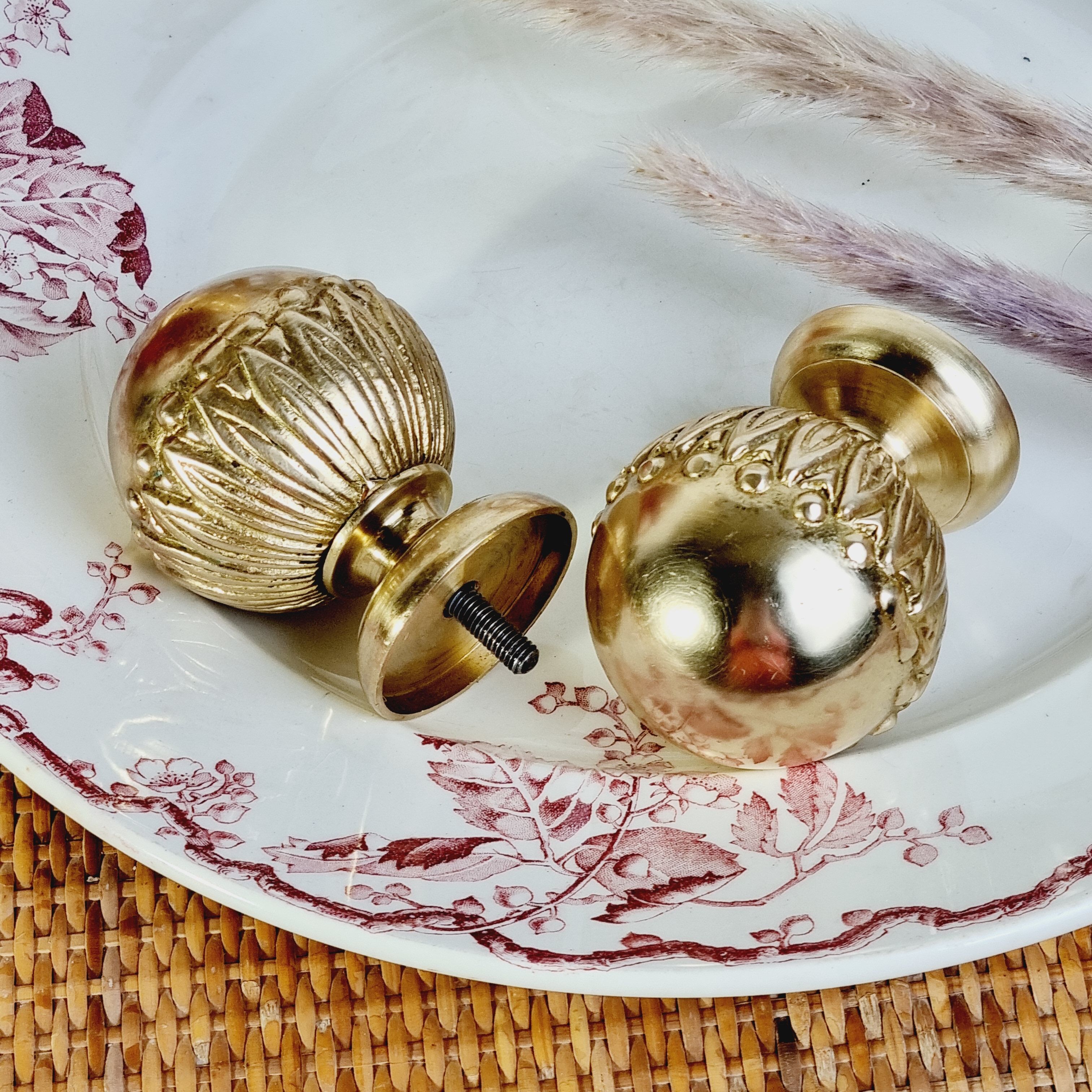 2 gilded brass door handles