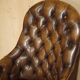 Fauteuil Chesterfield vintage en cuir vieilli