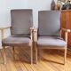 Paire de fauteuils moleskine marron