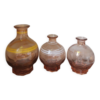 Set of 3 vintage decanters screen-printed pink molded glass