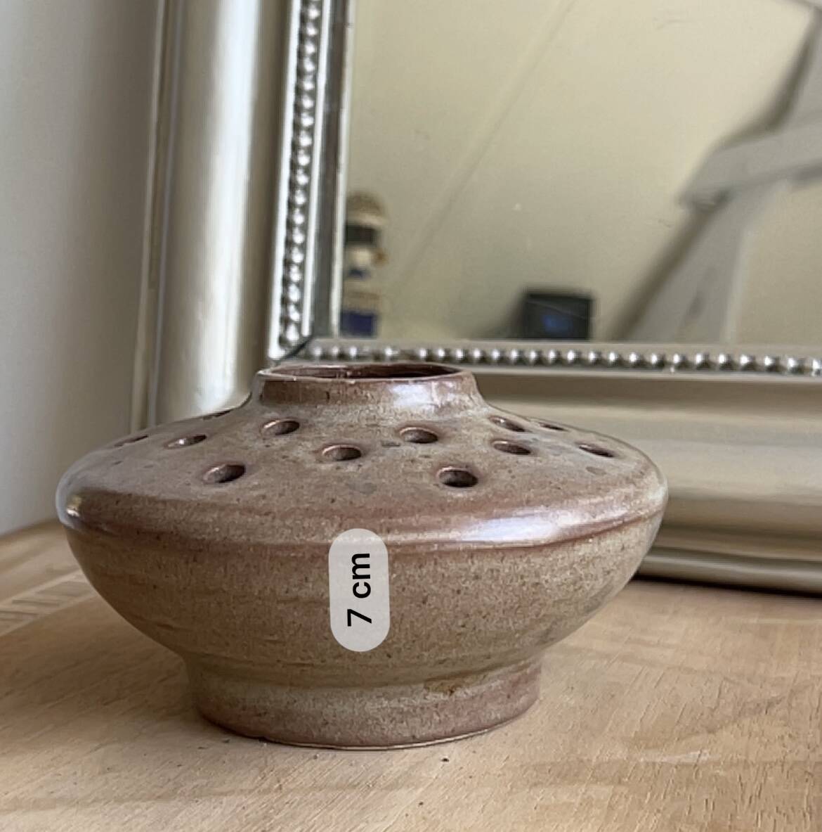 Vintage flower pot in perforated handcrafted stoneware, flattened round shape, p