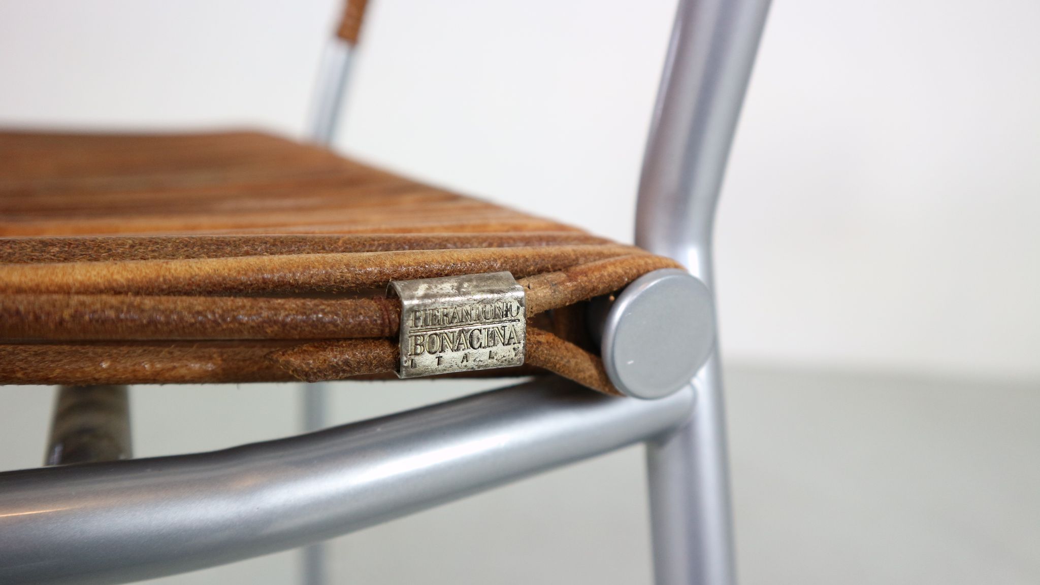 Set of 2 leather Mis B2 RVS armchairs by Tito Agnoli  for Pierantonio Bonacina