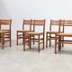 Set of six walnut and rattan dining chairs