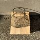 Vintage iron egg basket with hanse antique